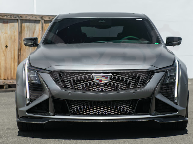 Cadillac CT5-V Blackwing factory OEM style carbon fiber front lip splitter and wheel arches, ground effects for enhanced sporty look.