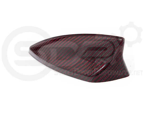 Red carbon fiber shark fin antenna cover for Cadillac ATS, CTS, CT4, and CT5 by Street Driven Performance.