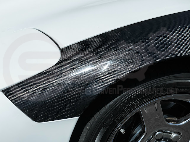 Factory style carbon fiber front and rear widebody fenders for Chevrolet Corvette C5 (1997-2004) by Street Driven Performance.