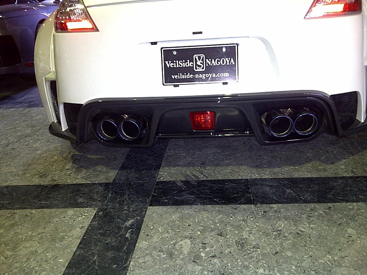 VeilSide 2009-2023 Nissan 370Z Ver. I Model FRP with CARBON Accents Rear Bumper (FRP/ CFRP)
