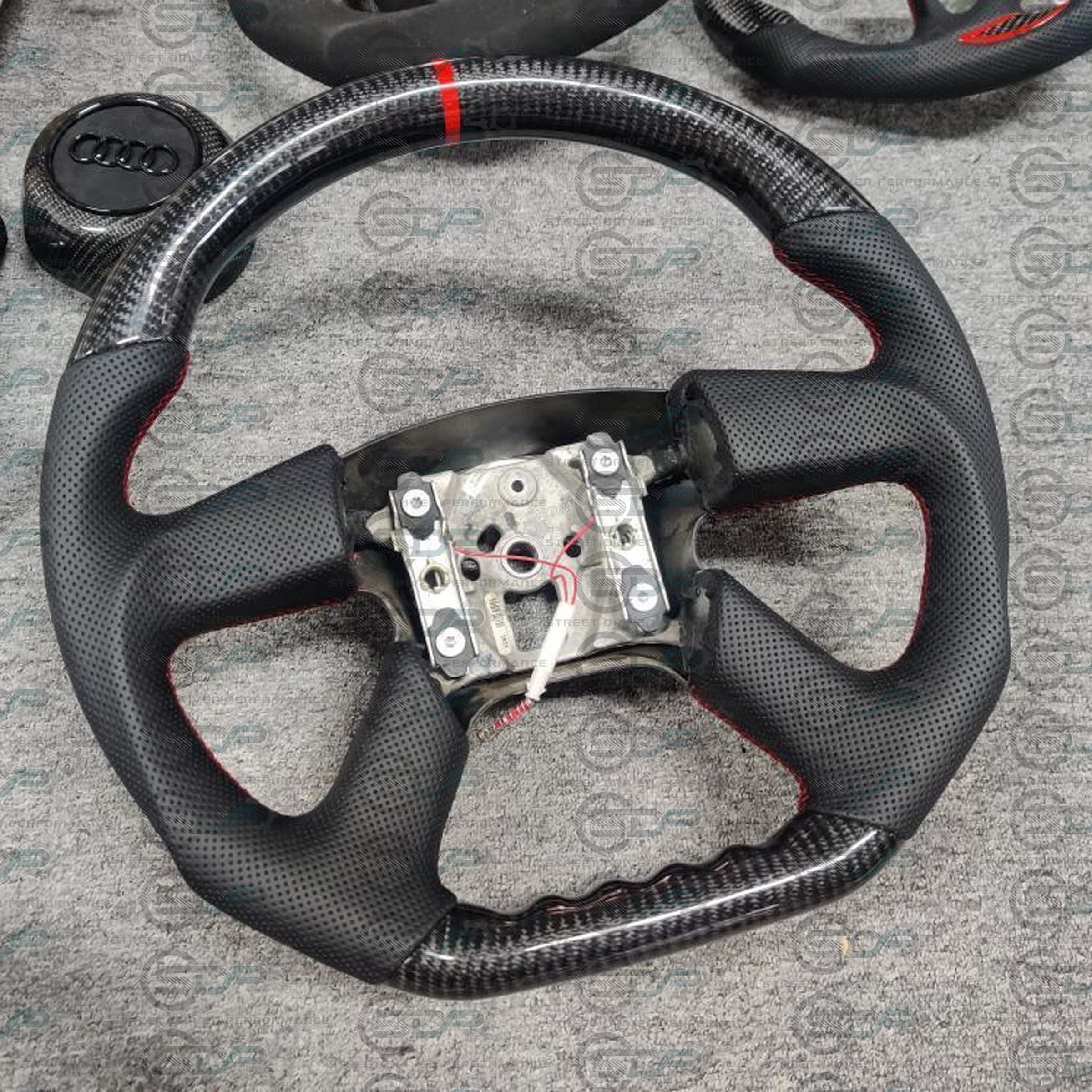 Custom carbon fiber steering wheel for Chevy Silverado 1500, 2500, 3500 (1999-2002) by Street Driven Performance, interior vehicle upgrade.