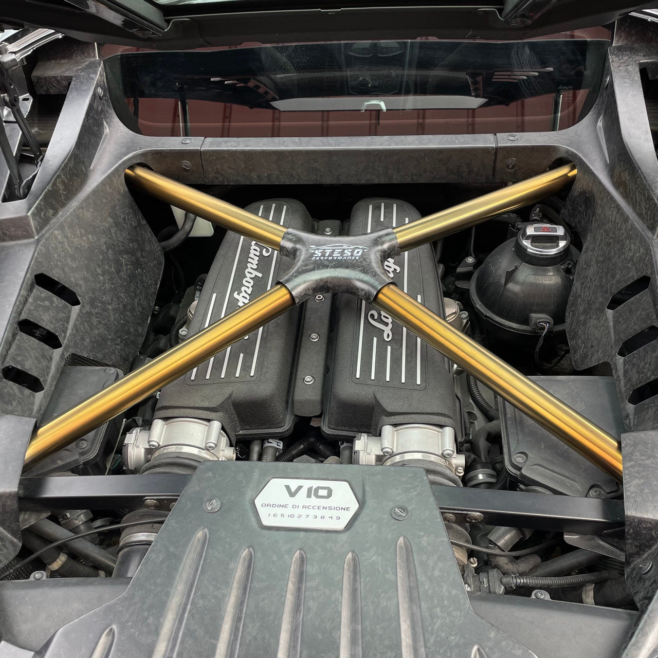 STESO Performance - Titanium X-brace for Lamborghini Huracan/Performante/Evo/STO RAW+Carbon fiber cover glossy