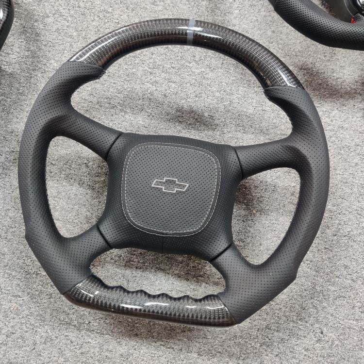 Custom carbon fiber steering wheel for 1999-2002 Chevrolet Suburban 1500/2500 interior, no built-in buttons, by Street Driven Performance