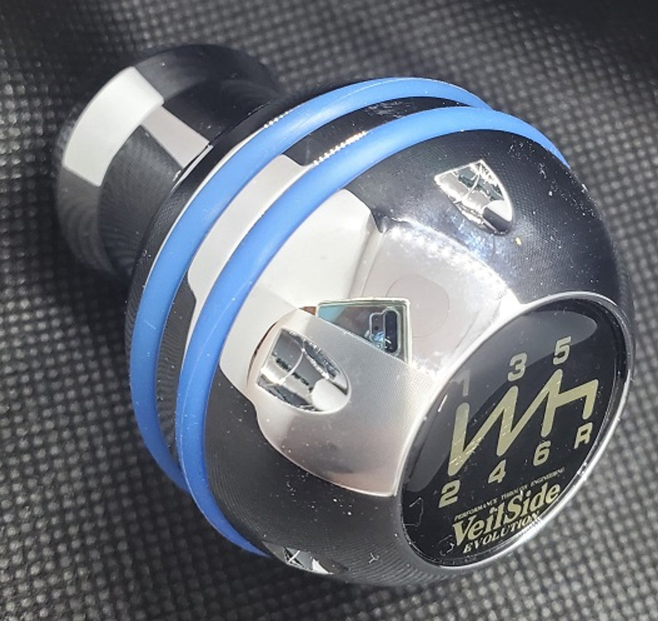 VeilSide Universal Mazda 3, 6, Miata, RX7 & RX8, Nissan S13, S14, S15, Z33, Z34, Celica, MR2 & MRS Shift Knob Type R II With Blue O-Ring..Material: T6061 Aluminum..Size: 2.5"/ 6.35cm tall..Made in Japan