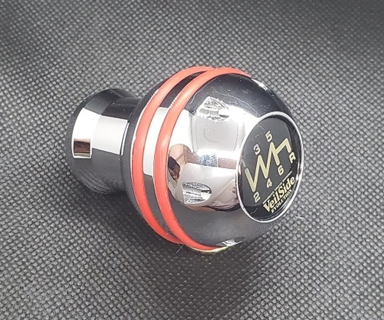 VeilSide Universal Mazda 3, 6, Miata, RX7 & RX8, Nissan S13, S14, S15, Z33, Z34, Celica, MR2 & MRS Shift Knob Type R II With Red O-Ring..Material: T6061 Aluminum..Size: 2.5"/ 6.35cm tall..Made in Japan