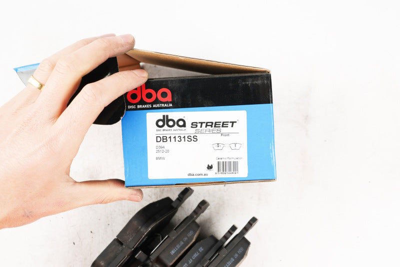 DBA 90-06 Audi 200 front OE brake pads with ATE brakes, part of the Street Series, showing the brake pad set with metal backing plates.