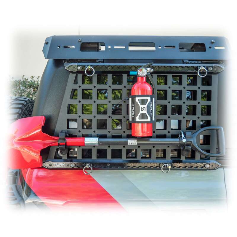 TURN Offroad Molle rubber clamp mount with durable hook for off-road gear attachment and utility organization.