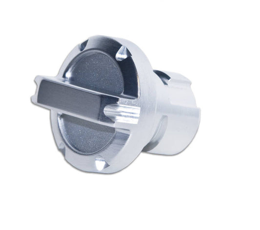 DV8 Offroad 2012-14 Jeep JK twist-on billet oil cap for engine hardware, shiny metal finish, mounted on engine.