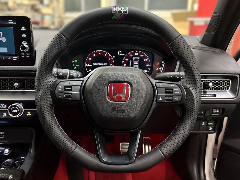 HKS Honda Civic FL5 replacement steering wheel with sporty design and textured grip, suitable for upgrading vehicle interior.