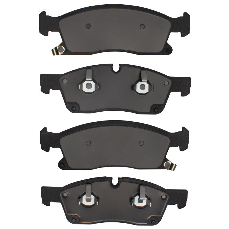 R1 Concepts Dodge Durango R1 11-22 front ceramic brake pads, OE type, shown with metal backing plates and friction surfaces.
