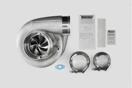 Turbosmart 8280 V-Band 1.24AR external wastegate attached to a turbocharger, showcasing the metallic V-band flange and wastegate components.