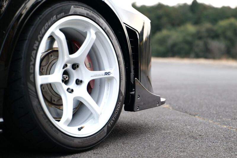 HKS Type-S Toyota GR Corolla GZEA14H Gen2 front spoiler installed on car, showcasing sleek body kit design and aerodynamic features.