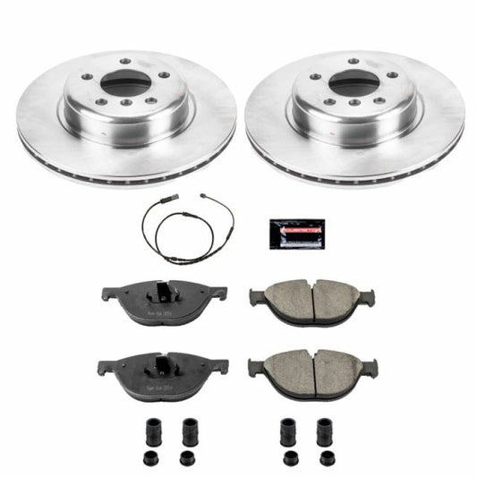 PowerStop OE brake kit for 2012-2013 BMW 528i front brakes, including rotors and pads, installed on a BMW 528i.