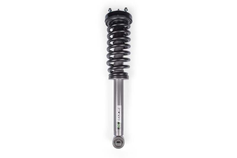 Zone Offroad Ford F150 4-inch loaded shock strut for 14-26 models, showing the durable shock absorber with mounting hardware.