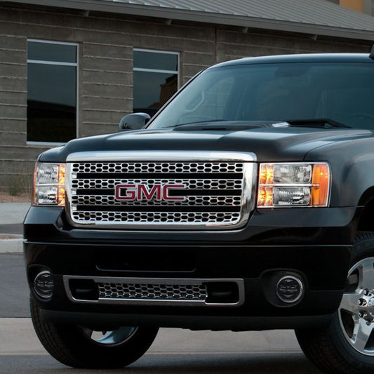Pair of Oracle high-powered LED fog lights for GMC Sierra 1500/2500/3500, 6000K bright white illumination, shown in the image.