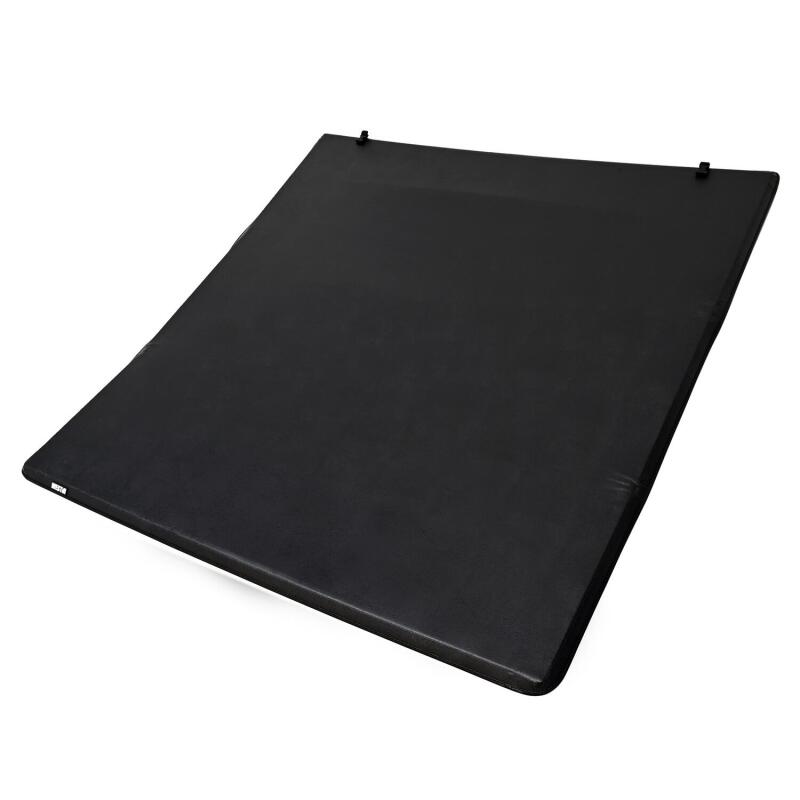 Westin 2024+ Toyota Tacoma 74-inch bed soft tri-fold tonneau cover installed on pickup truck bed, providing weather protection.