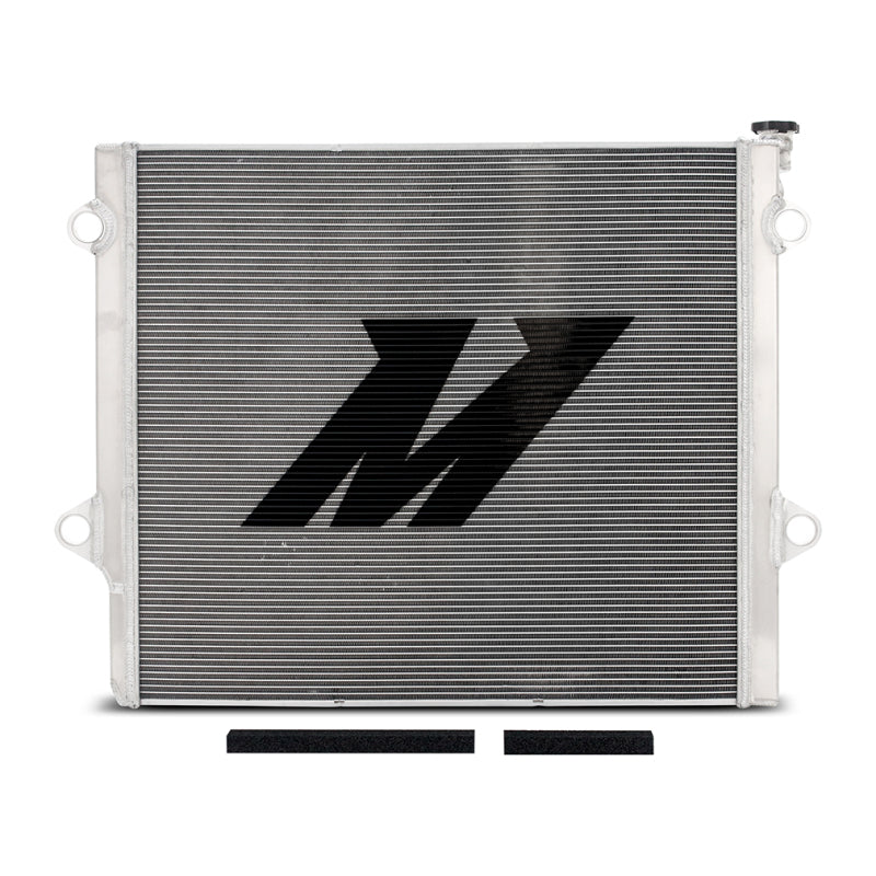Mishimoto aluminum radiator for Toyota 4-Runner and GX470 4.7L engine, featuring a sleek silver finish and multiple cooling fins.