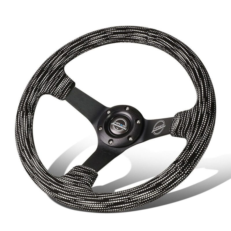 NRG reinforced 350mm microfiber steering wheel with black stitching and 5mm matte black spokes, designed for car racing and performance.