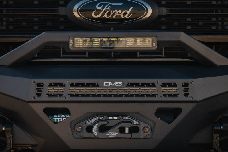 Steel front bumper for Ford Super Duty F-250/F-350 from DV8 Offroad Spec Series, showing rugged construction and mounting points.