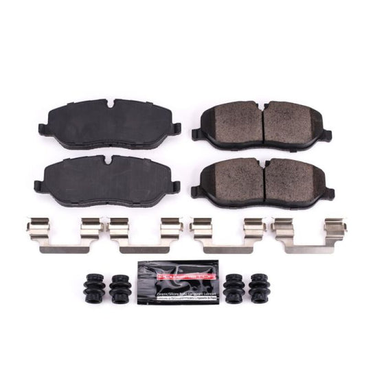 PowerStop Z23 Evolution Sport front brake pads with hardware for Land Rover LR3 2005-2009, showing the brake pad set with mounting hardware.