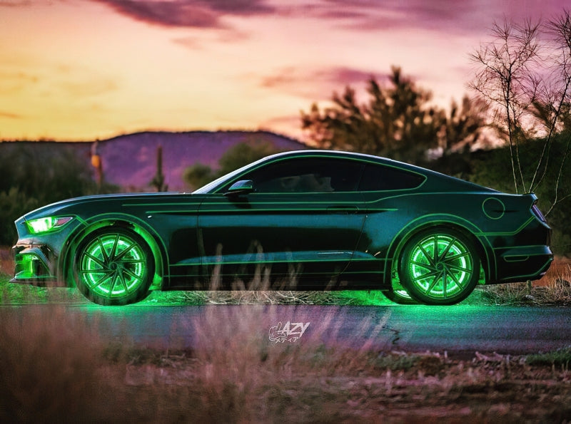 Oracle LED Illuminated Wheel Rings ColorSHIFT light strip showing vibrant, multicolor glow around car wheel rim.