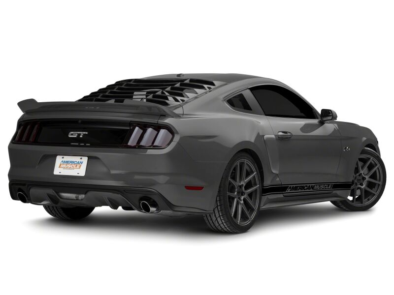 Red Raxiom 15-23 Ford Mustang Axial Series LED rear side marker lights on the vehicle's side, showcasing bright illumination.