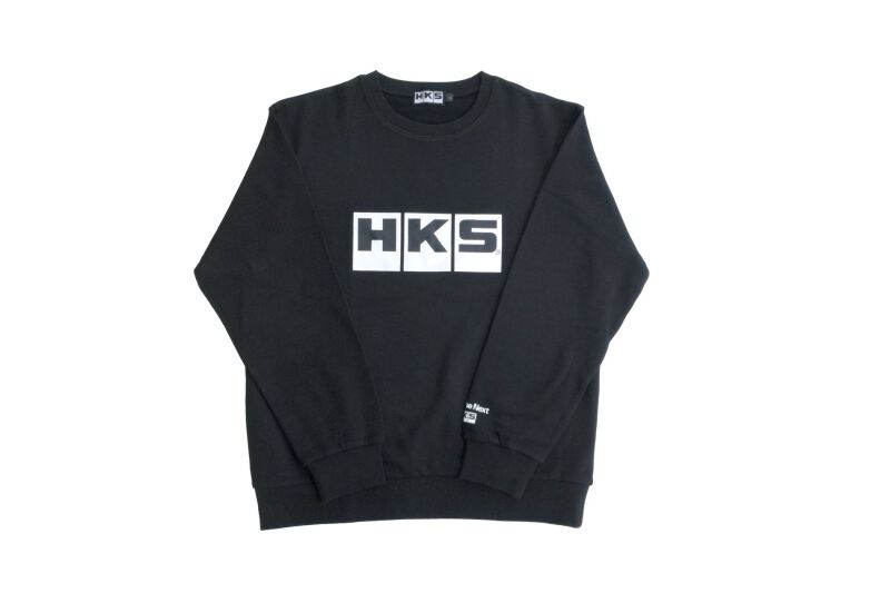 Black HKS pullover shirt, medium size, with a casual fit and soft fabric, displayed on a hanger.