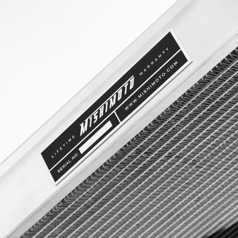 Mishimoto aluminum radiator for 2003-2006 Nissan 350Z manual transmission, showing sleek silver radiator with cooling fins.