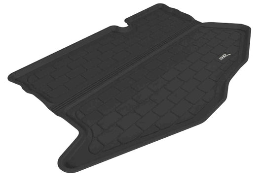 Black 3D MAXpider rubber cargo liner for Ford Fiesta 2011-2019, designed to protect the trunk floor with a textured surface.