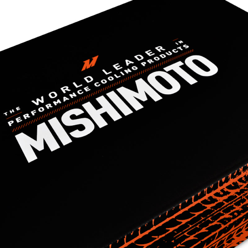 Mishimoto aluminum radiator for 1991-1999 Mitsubishi 3000GT Turbo manual transmission, featuring sleek metal fins and fittings.