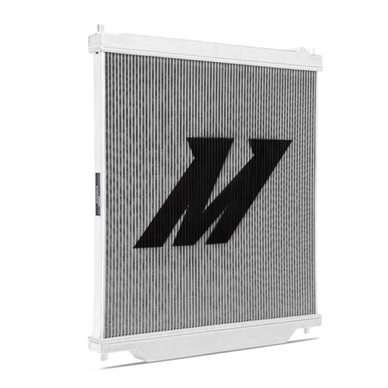 Mishimoto aluminum radiator for Ford F250 6.0L Powerstroke engine, showing the sleek, lightweight design with multiple cooling fins.