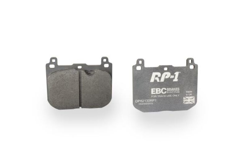 Pair of EBC Racing RP-1 front and rear brake pads for Lotus Evora 09-16, high-performance racing brake components.