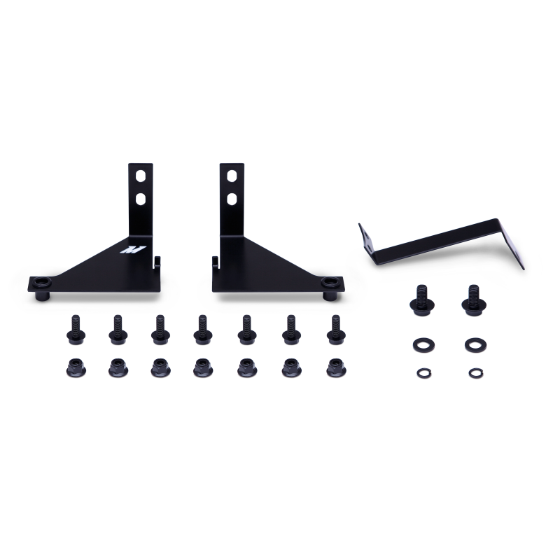 Mishimoto 14-16 Ford Fiesta ST silver thermostatic oil cooler kit with metal fittings and hoses, designed for engine cooling.