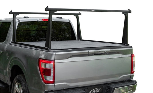 Access ADARAC 08-16 Ford F-250/F-350/F-450 black 8ft bed ladder rack with sturdy steel construction and secure mounting points.