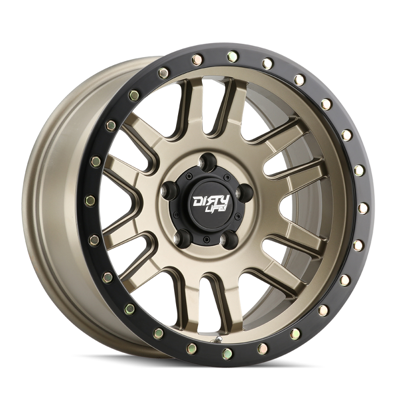 Dirty Life Canyon Pro 17x9 satin gold beadlock cast wheel with 6x139.7 bolt pattern, 0mm offset, and 106mm hub for off-road vehicles.