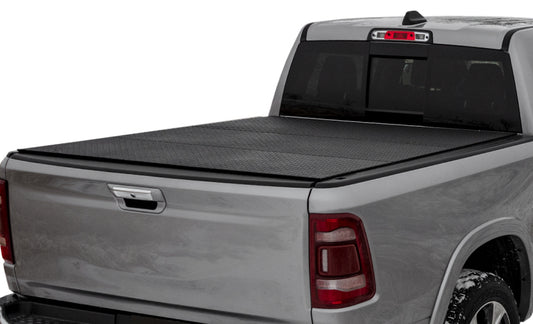 Access Tri-Fold Hard Tonneau Cover for Ram 1500 and 2500/3500 6ft 4in bed with urethane diamond plate finish.