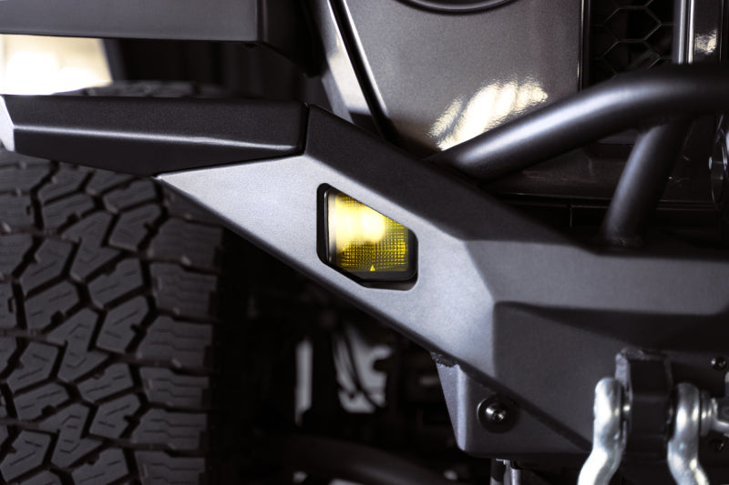 Steel front bumper for Jeep Wrangler JK, JL, and Gladiator JT by DV8 Offroad, featuring rugged design and durable construction.