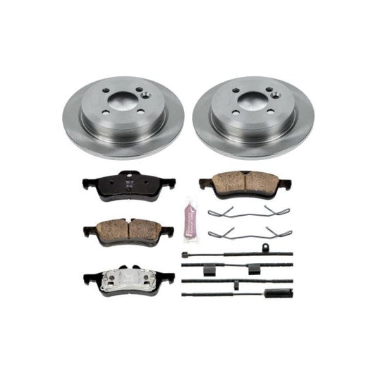 PowerStop OE Mini Cooper rear Autospecialty brake kit with brake pads and rotors installed on a vehicle.