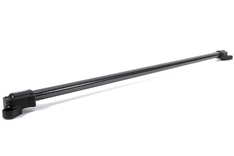 Perrin Performance carbon fiber front strut brace installed on Subaru BRZ, Toyota GR86, and Scion FR-S for enhanced chassis stability.