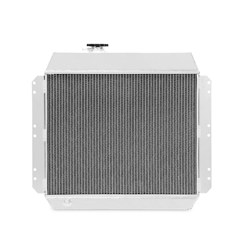 Mishimoto Chevrolet Bel-Air 50-54 aluminum radiator, X-Line design, with cooling fins and inlet/outlet hoses visible.