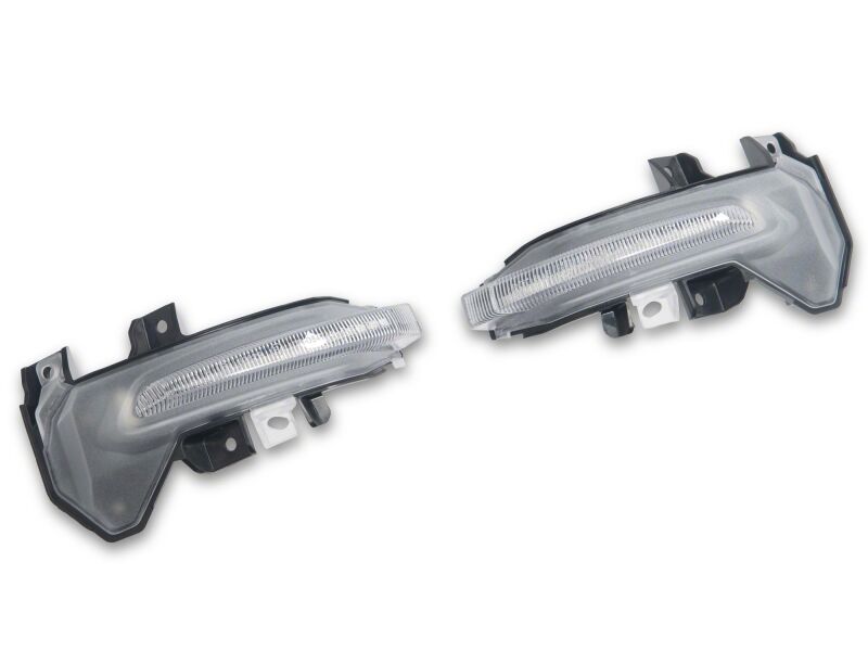 Raxiom Toyota Tundra side mirrors with clear sequential LED mirror lights, showcasing the sleek, modern design.