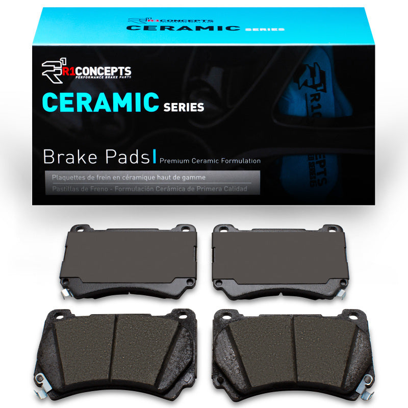 R1 Concepts Hyundai Equus 2009-2014 front ceramic brake pads, OE quality, showing new brake pad set with metal backing plates.
