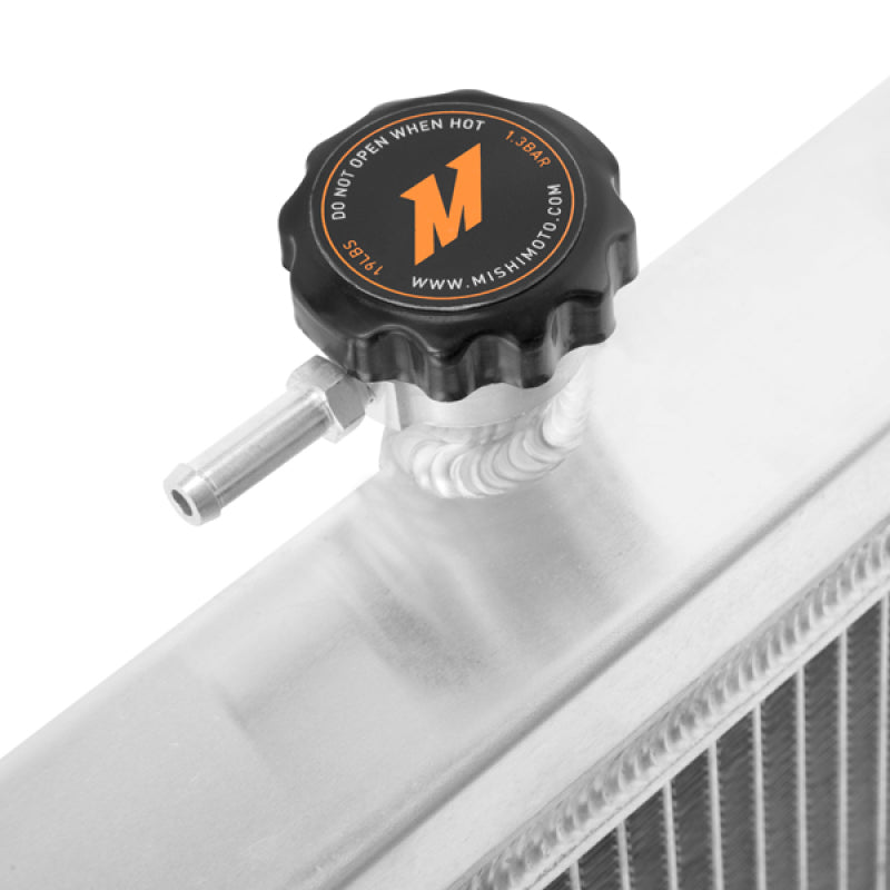 Mishimoto aluminum radiator for 2003-2006 Nissan 350Z, manual transmission, with polished finish and core vents.