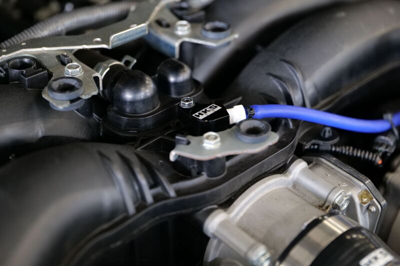 HKS FA20/FA24 pressure sensor kit with gauge components, showing sensor and fittings for engine boost monitoring.