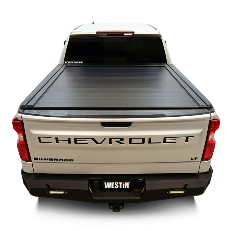 Westin black roll-up tonneau cover for Silverado/Sierra 1500 5ft 8in bed, manual retractable design, sleek and secure.