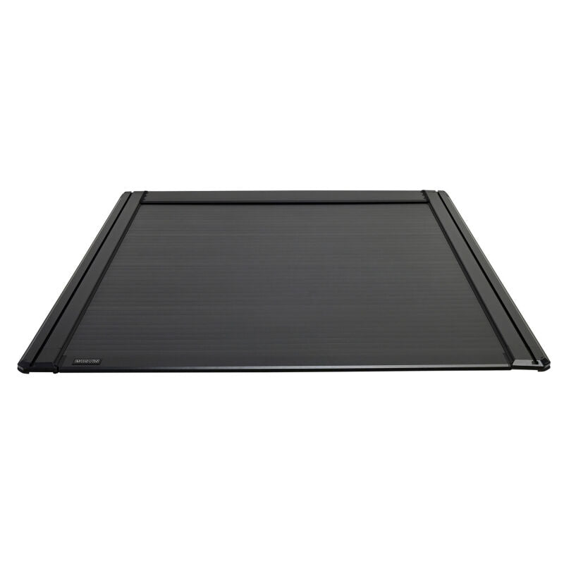 Westin electric retractable tonneau cover for 2019-2026 Ram 1500 with 6.4ft bed, black, installed on truck bed.
