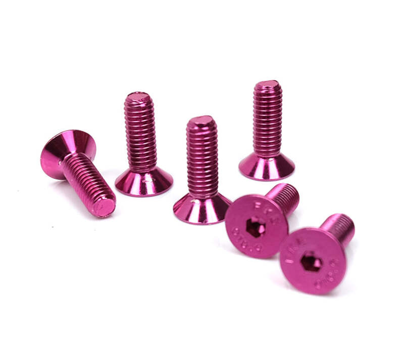 NRG pink conical steering wheel screw kit for steering wheels, featuring upgrade hardware for secure installation.