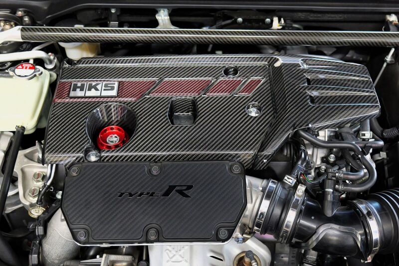 HKS Honda Civic Type R FL5 FK8 dry carbon fiber engine cover showing sleek, lightweight design with branding details.