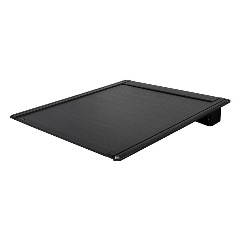 Westin electric retractable tonneau cover for 2019-2026 Ram 1500 with 6.4ft bed, black, shown installed on truck bed.