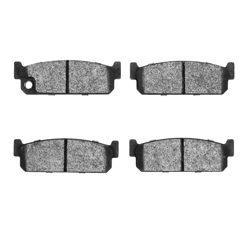 R1 Concepts OE brake pads for Infiniti Q45 R1 90-93 rear brake pad set, showing black friction material and mounting hardware